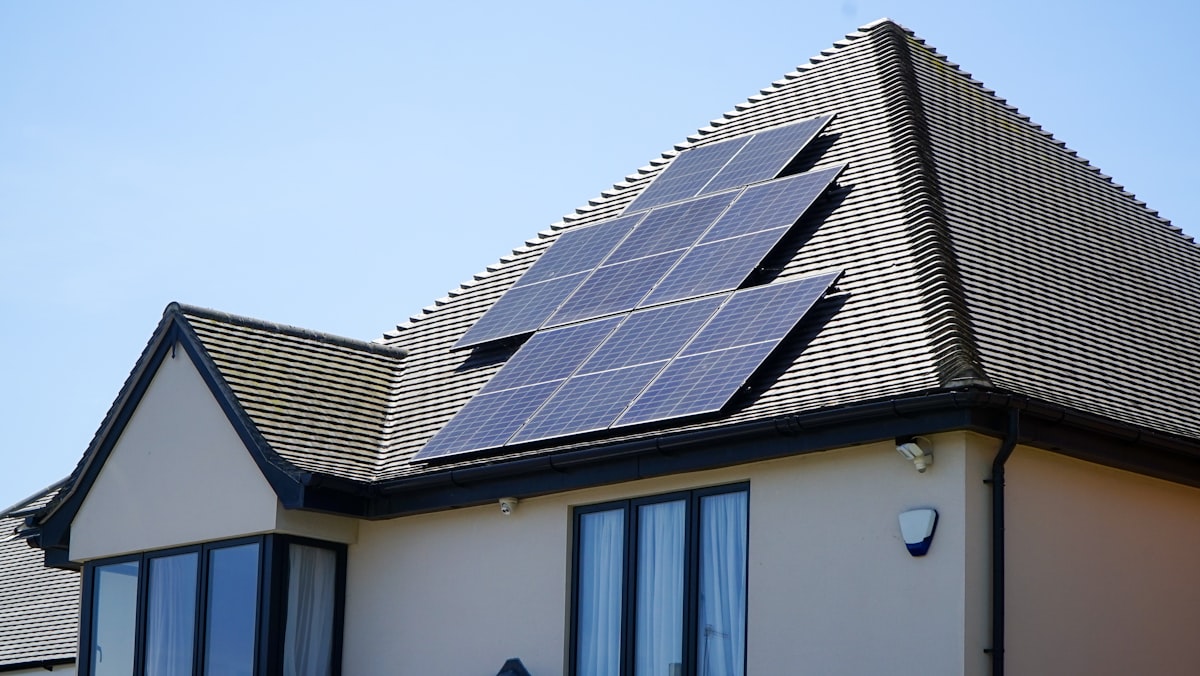 Aerial view of residential solar array — solar proposal software helps contractors quote and close rooftop PV installations faster