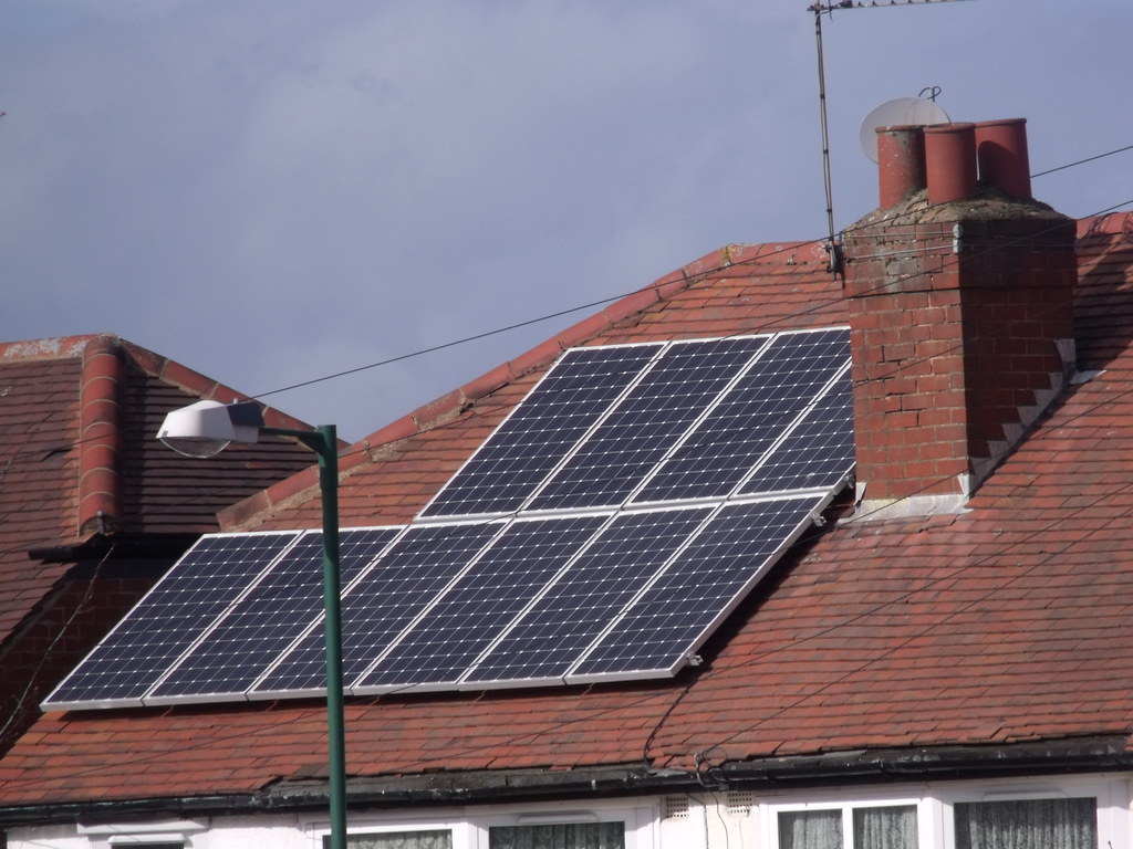 Best CRM for solar contractors — solar panel array installed on residential rooftop in Northfield